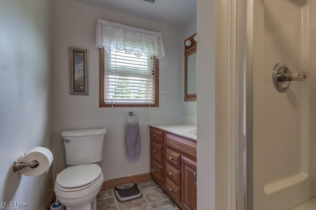 382 E Mohawk Dr, Malvern, OH 44644 - bathroom featuring toilet, vanity, baseboards, and tile patterned flooring