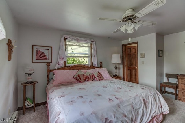 382 E Mohawk Dr, Malvern, OH 44644 - bedroom featuring light carpet, a baseboard heating unit, ceiling fan, and baseboards