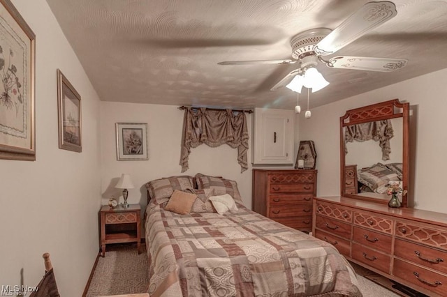 382 E Mohawk Dr, Malvern, OH 44644 - bedroom featuring light colored carpet and a ceiling fan