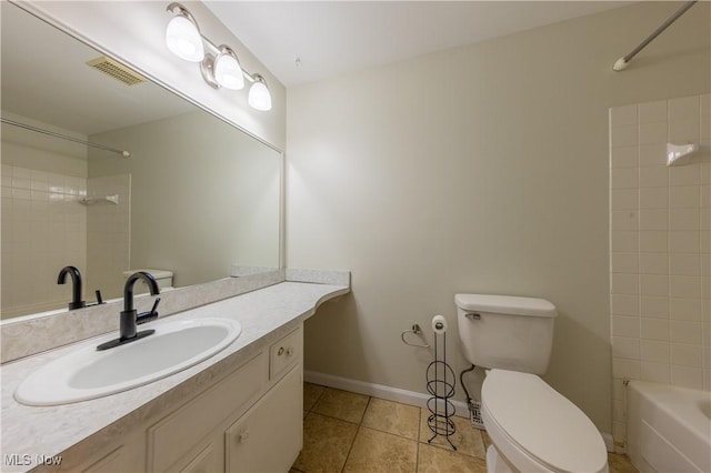 bathroom with visible vents, baseboards, toilet, tile patterned flooring, and vanity