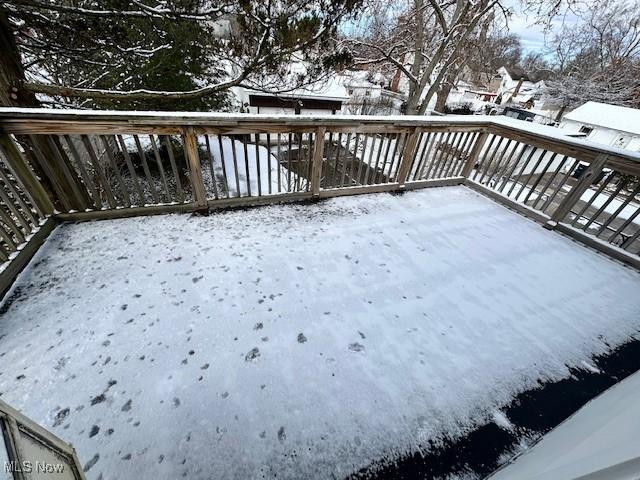 view of snow covered deck