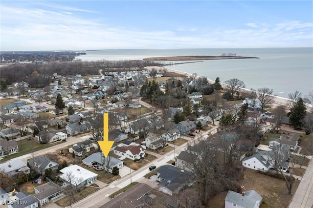 aerial view with a residential view and a water view