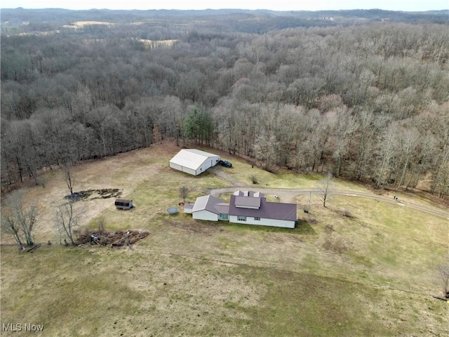 drone / aerial view with a rural view and a view of trees