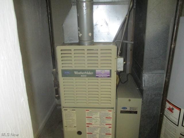 utilities featuring heating unit and water heater