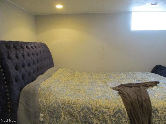 bedroom with recessed lighting