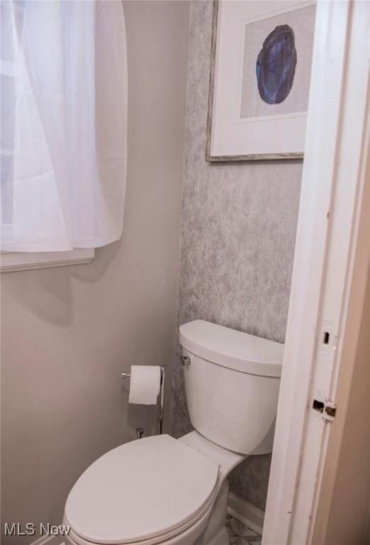 bathroom featuring toilet