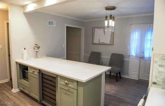 kitchen featuring beverage cooler, visible vents, dark wood finished floors, and light countertops