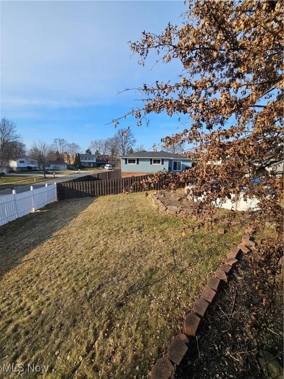 view of yard with fence