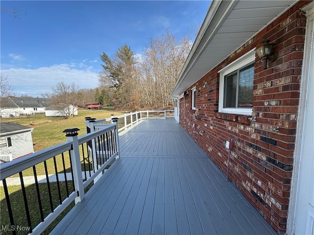 deck featuring a yard