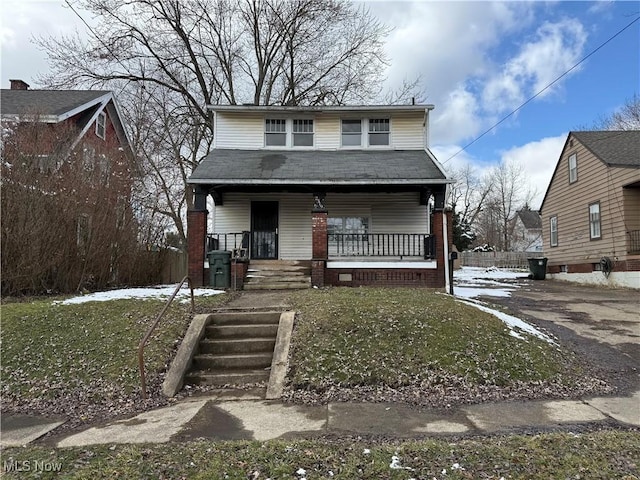 view of front of property featuring covered porch