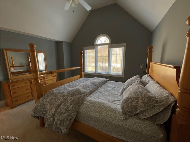 carpeted bedroom with lofted ceiling and ceiling fan