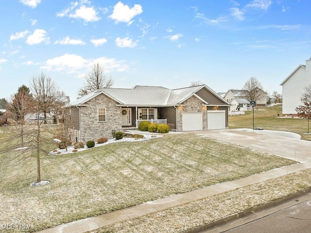 ranch-style home with a garage, covered porch, stone siding, concrete driveway, and a front lawn