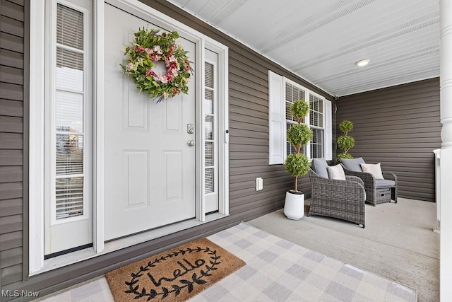 entrance to property with a porch