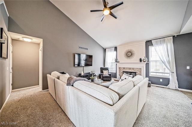 living area featuring visible vents, a brick fireplace, light carpet, high vaulted ceiling, and baseboards