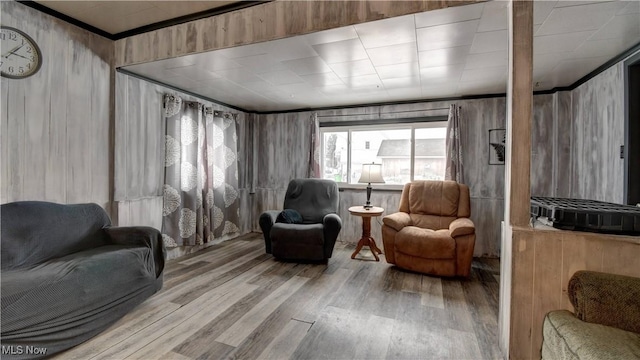 sitting room featuring wood finished floors