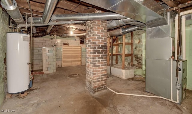 unfinished basement featuring gas water heater and heating unit