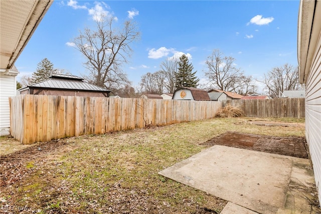 view of yard with a fenced backyard, a patio, and a gazebo