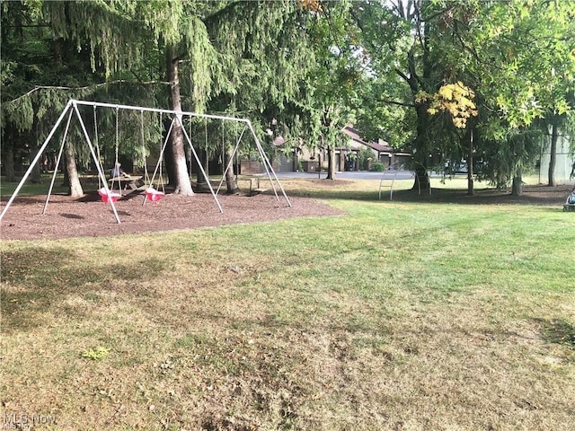 view of yard featuring playground community