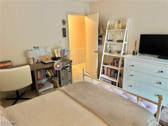 bedroom featuring carpet