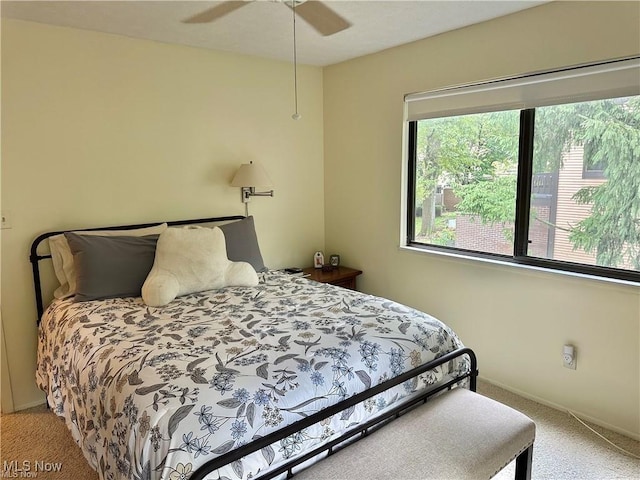 bedroom featuring a ceiling fan and carpet flooring