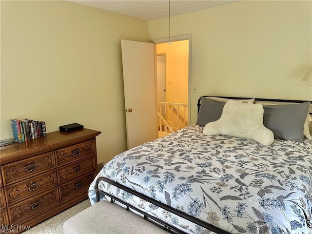 bedroom featuring carpet