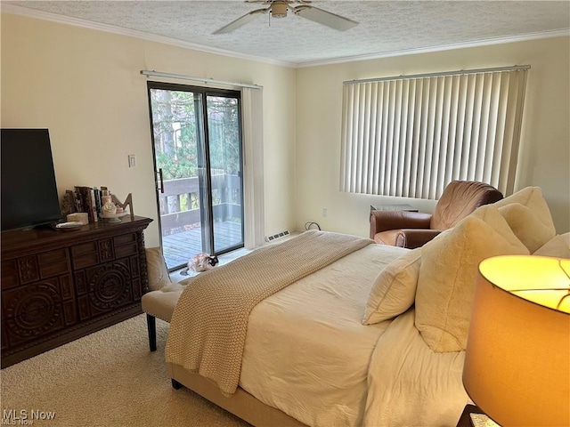 bedroom with carpet, access to outside, crown molding, and a textured ceiling