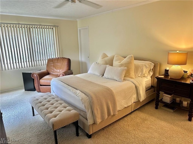 bedroom with ornamental molding, light carpet, a textured ceiling, and a ceiling fan