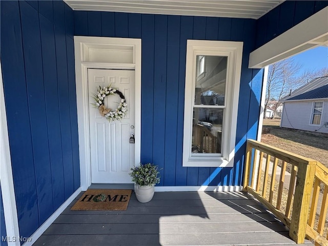 entrance to property with a porch