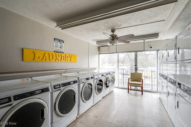 common laundry area featuring a ceiling fan, stacked washer / drying machine, a textured ceiling, and separate washer and dryer