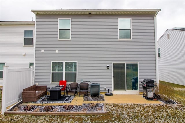 back of house featuring a patio and central air condition unit