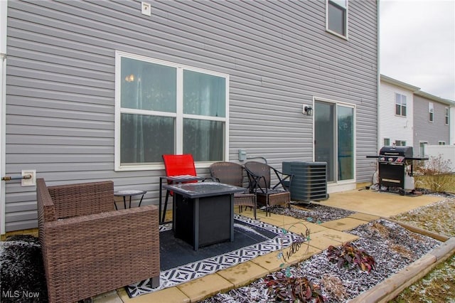 view of patio with grilling area and central AC