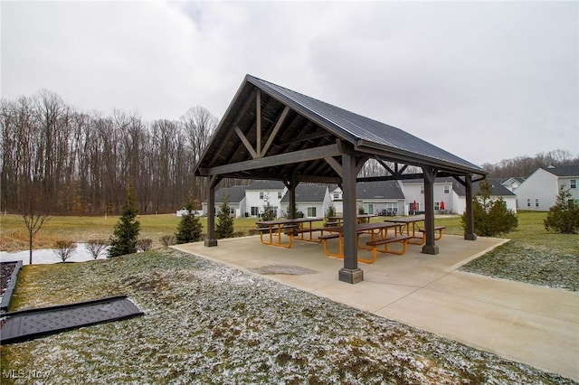 view of community featuring a lawn and a gazebo