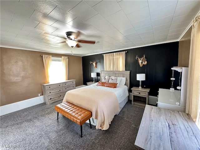 bedroom featuring a ceiling fan, carpet flooring, and baseboards