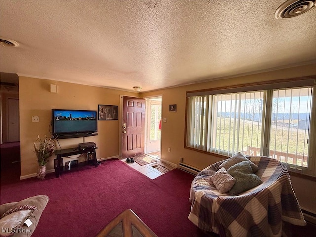 carpeted living area with a textured ceiling, a baseboard radiator, visible vents, and baseboards