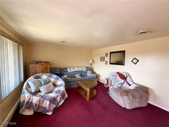 living area featuring visible vents, a baseboard heating unit, carpet flooring, a textured ceiling, and baseboards