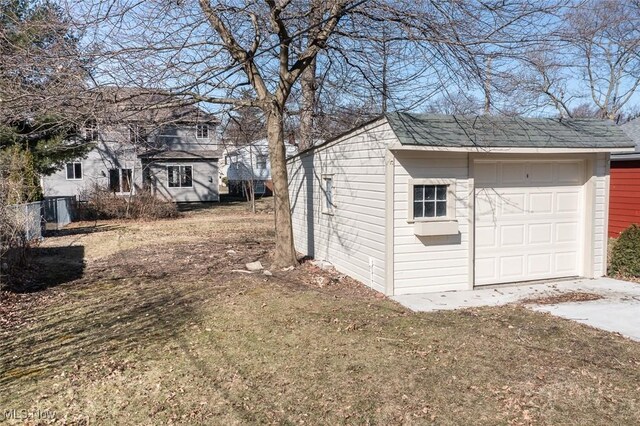 garage with fence