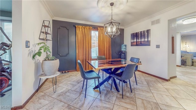 dining area featuring baseboards, visible vents, and ornamental molding