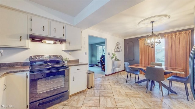 kitchen featuring crown molding, black / electric stove, dark countertops, and under cabinet range hood