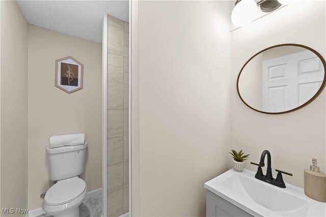 full bathroom featuring a sink and toilet