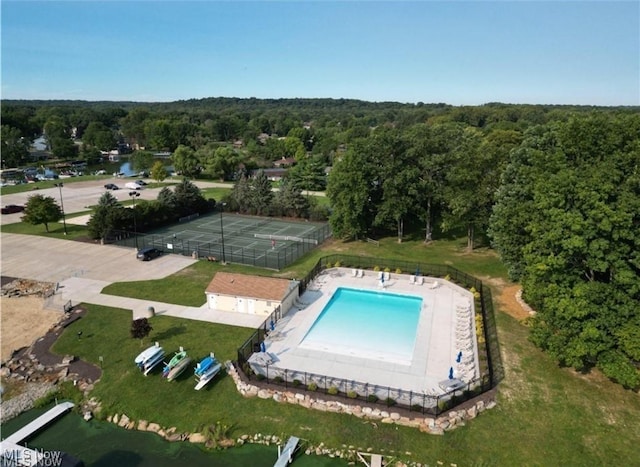 birds eye view of property with a forest view