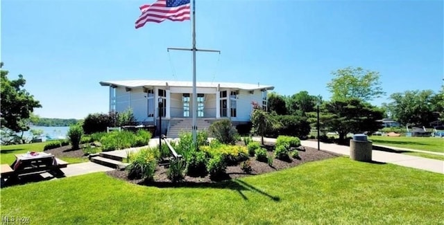 surrounding community featuring a lawn