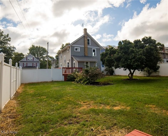 view of yard with a fenced backyard