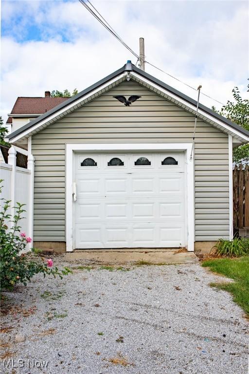 detached garage with fence