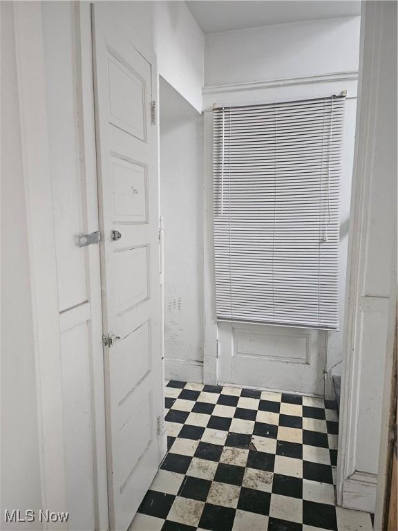 bathroom with tile patterned floors