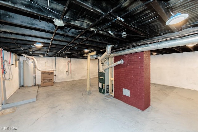 unfinished basement with electric water heater