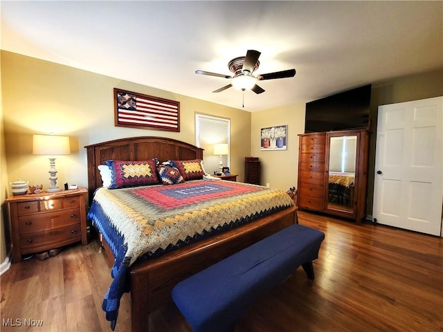 bedroom featuring ceiling fan and wood finished floors