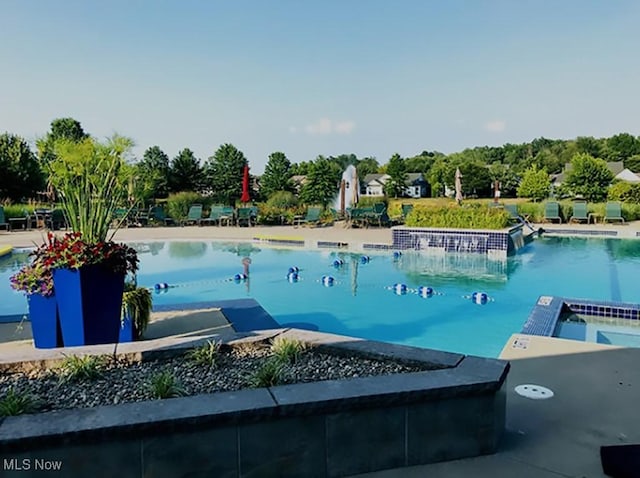 community pool with a patio