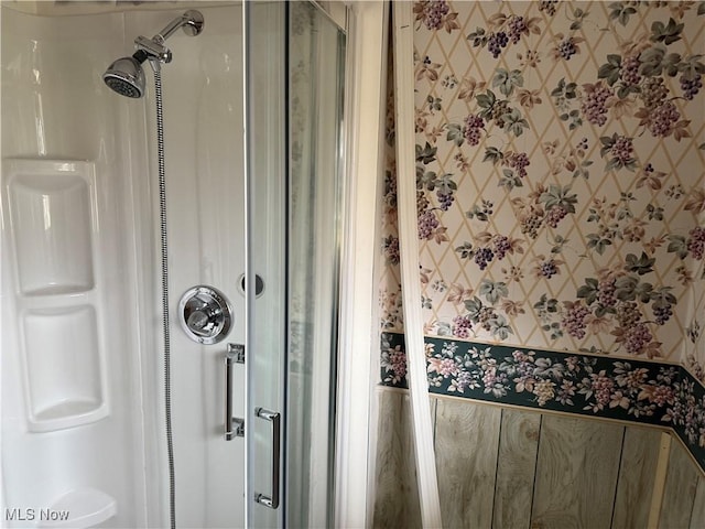 bathroom with a shower stall