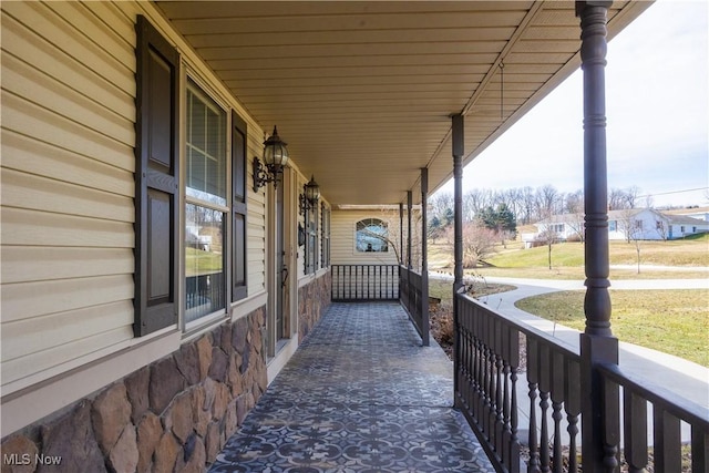 view of patio featuring a porch