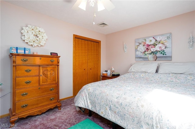 carpeted bedroom featuring a closet, visible vents, a ceiling fan, and baseboards